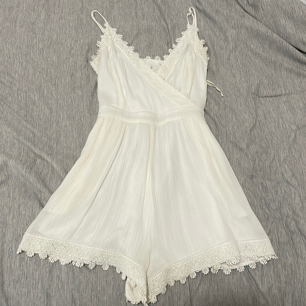 white flowery jumper